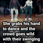 (VIDEO)She grabs his hand to dance and the crowd goes wild with their swinging dance moves