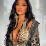 Nicole Scherzinger sizzles in a VERY racy cut-out swimsuit