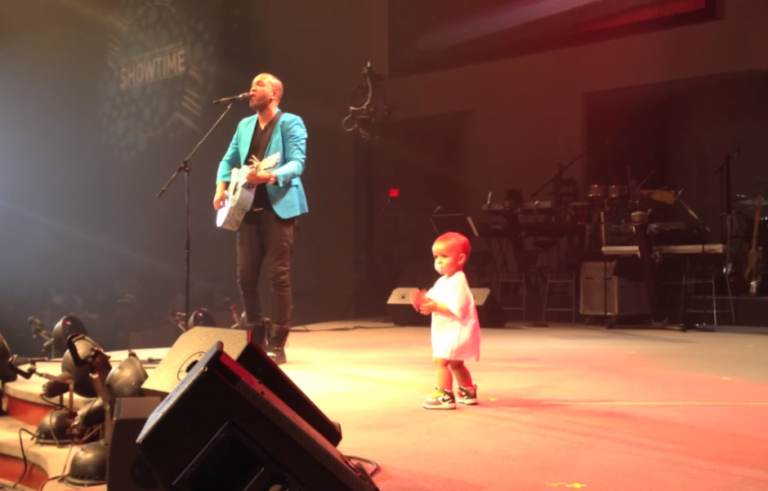 (VIDEO)This Tiny Baby Ran On Stage To Hug His Dad. But What He Did Next Put The Crowd On Their Feet!