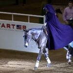 (VIDEO)She rides up on a horse, then she removes her cape and STUNS everyone