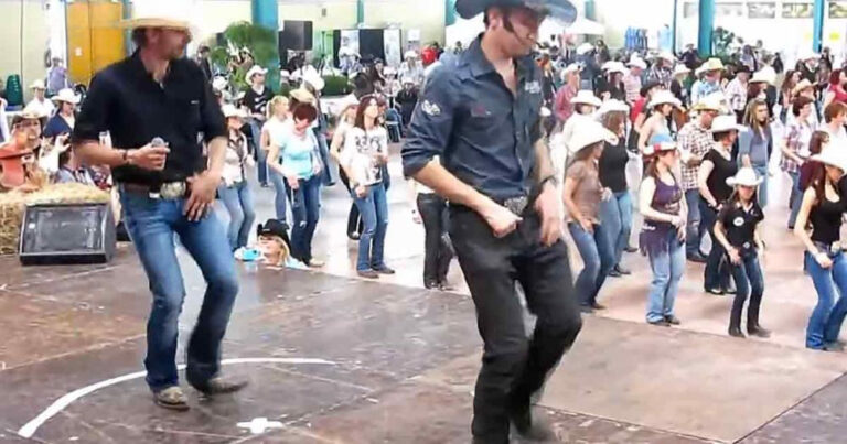 (VIDEO)Two cowboy buddies do a jig that draws a big crowd