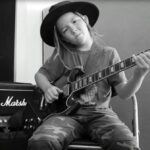 9-Year-Old Guitar Prodigy Plays Flawless Cover of “Tennessee Whiskey”