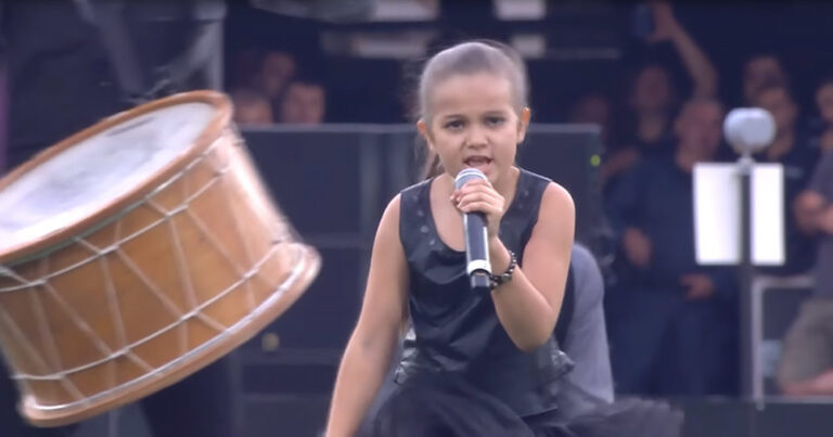 (VIDEO)Girl Shocks Crowd by Singing “We Will Rock You” With Drumline