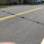 If You Ever See Black Cables Stretching Across The Road, This Is What You Should Do