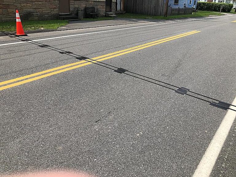 If You Ever See Black Cables Stretching Across The Road, This Is What You Should Do