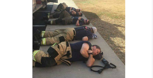 Man snaps heartbreaking photo of firefighters taking a rest after 24 hours of working nonstop