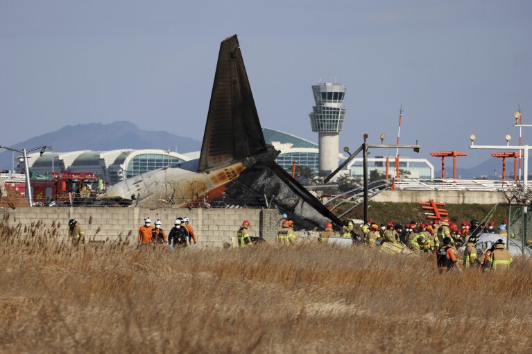 Jetliner skids off runway and bursts into flames while landing in South Korea, killing 179