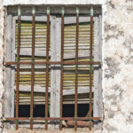 If you see window grills with a curve at the bottom here’s what it means