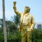 Pastor sparks backlash after ‘stupid’ response to Trump erecting 22-foot golden statue of himself