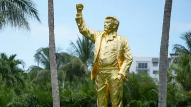 Pastor sparks backlash after ‘stupid’ response to Trump erecting 22-foot golden statue of himself