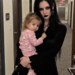 The Goth Woman Across the Hall Never Spoke to Anyone – Then One Night She Knocked on My Door Holding My Two-Year-Old Daughter and Said, ‘Your Husband Doesn’t Know I Saw Him’